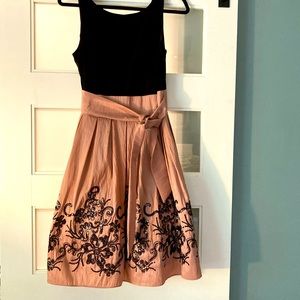 Lovely, elegant dress in black and dusky mauve.